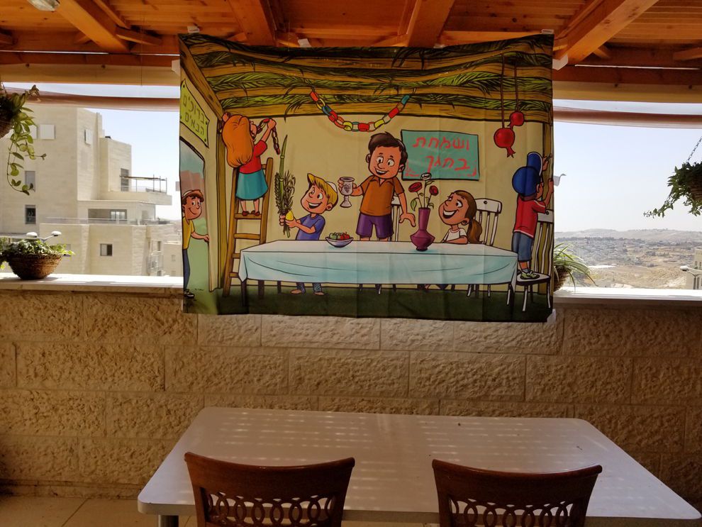 בד תמונה לסוכה 'בונים סוכה'
